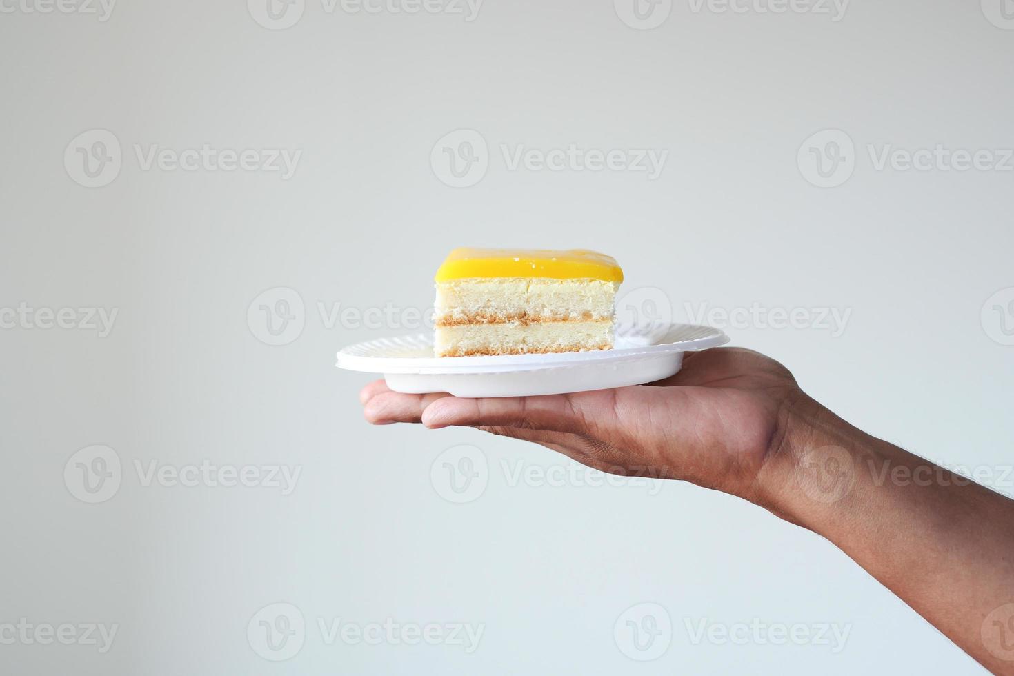 men holding a cream cake with copy space photo