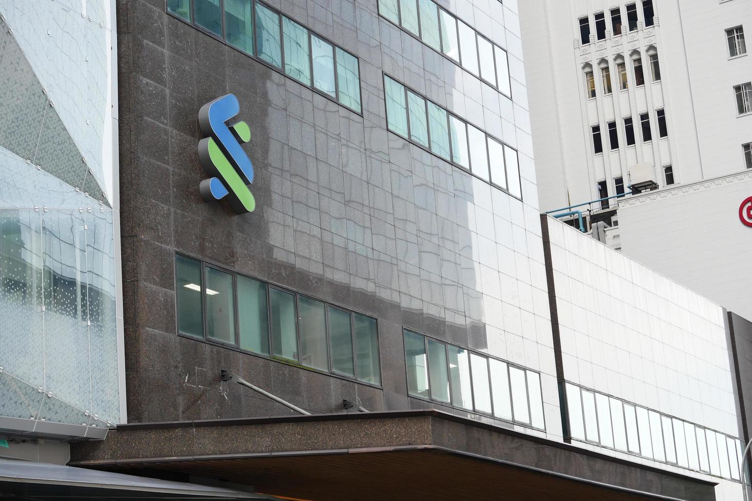 Singapore 1 june 2022. standard chartered bank logo on financial building photo