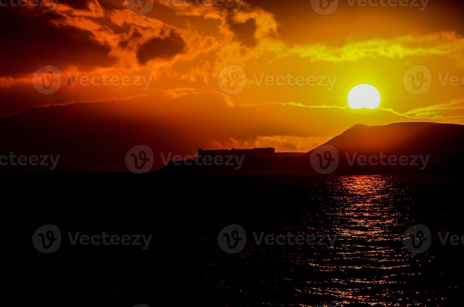 Ocean over the sunset photo