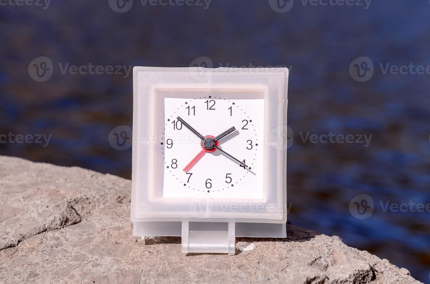 Clock on the ground photo