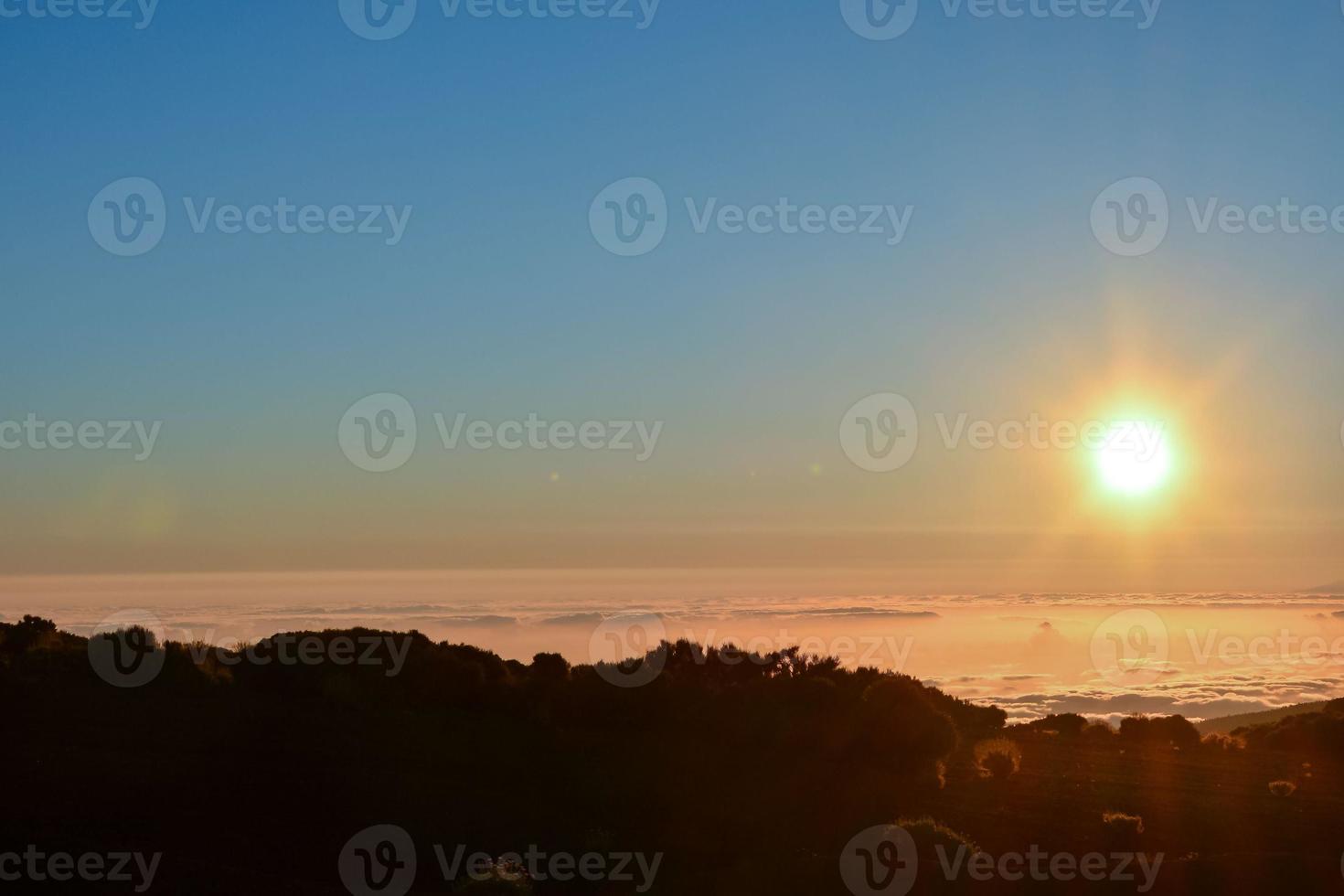 Landscape over the sunset photo