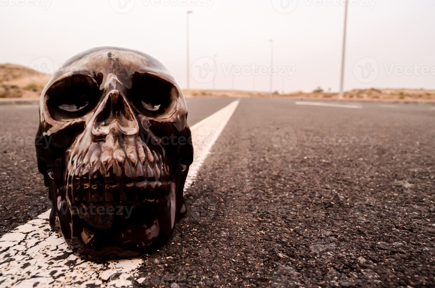 Skull miniature on the ground photo