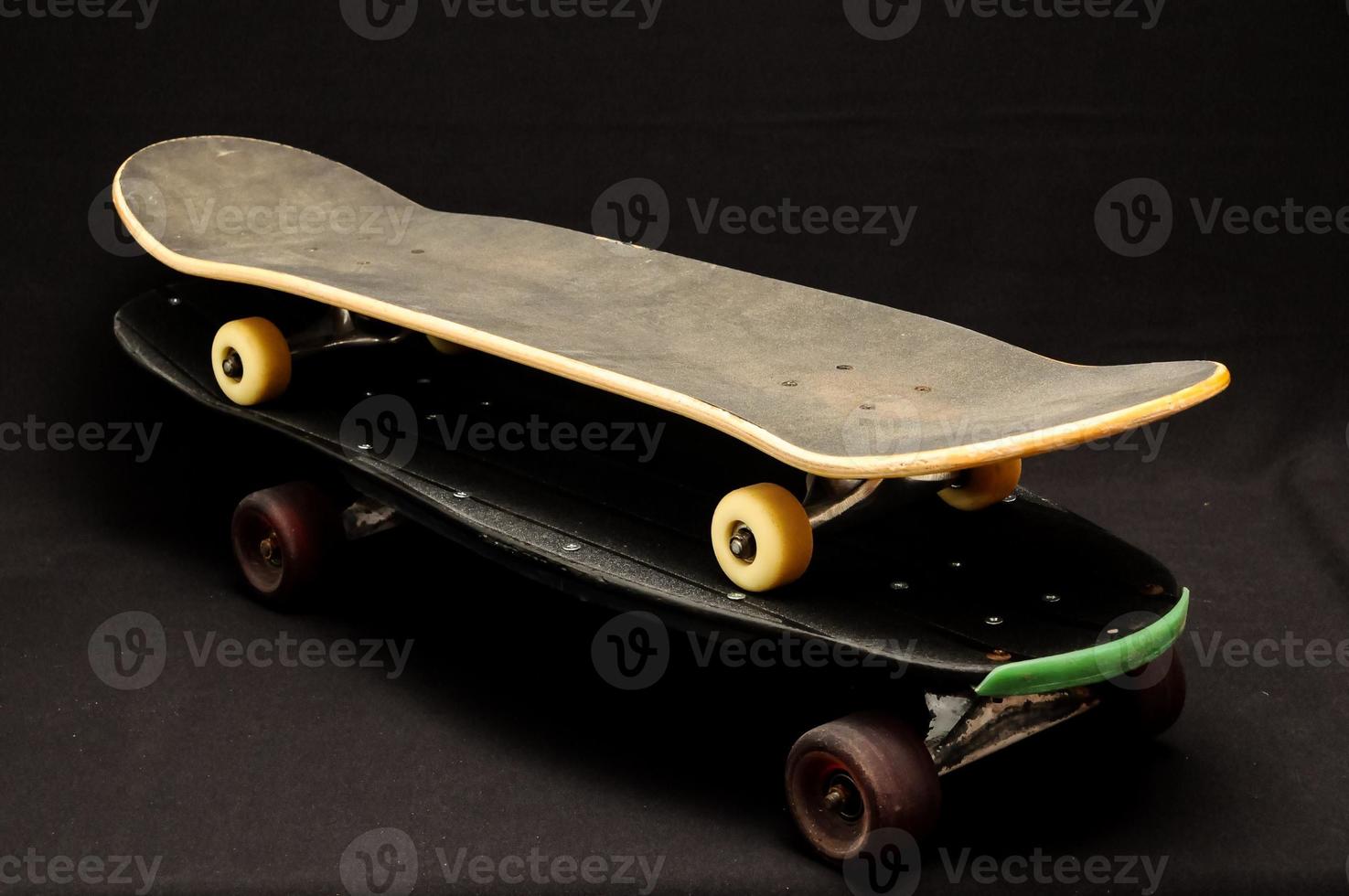 Isolated stacked skateboard photo