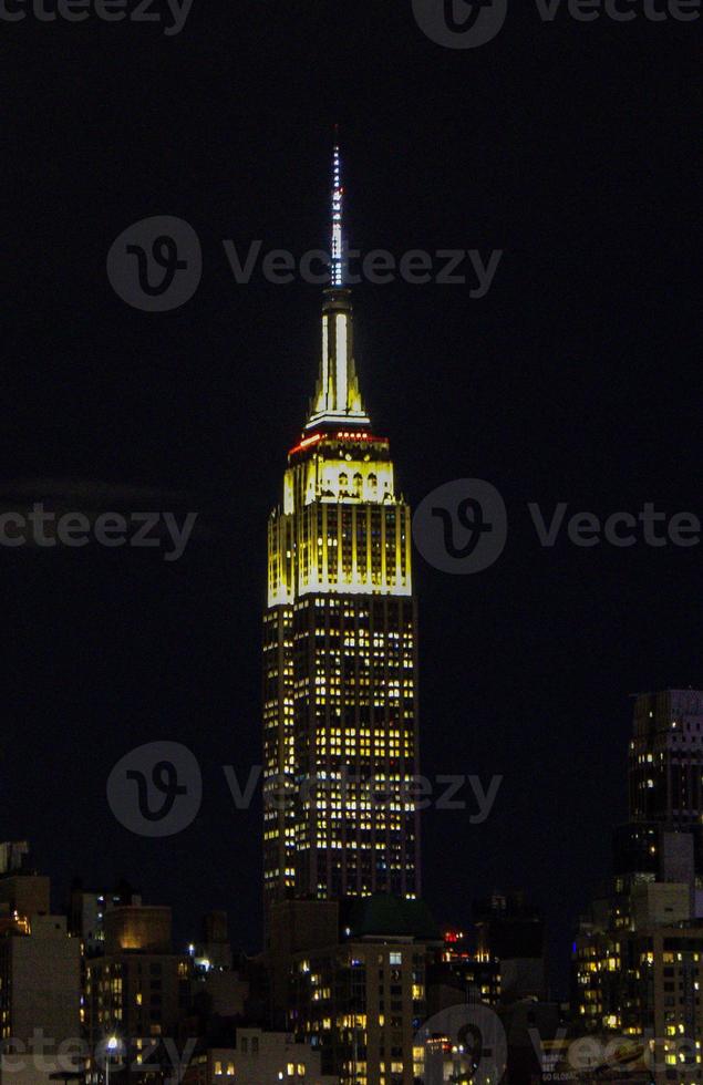 Empire State Building in New York City at night photo