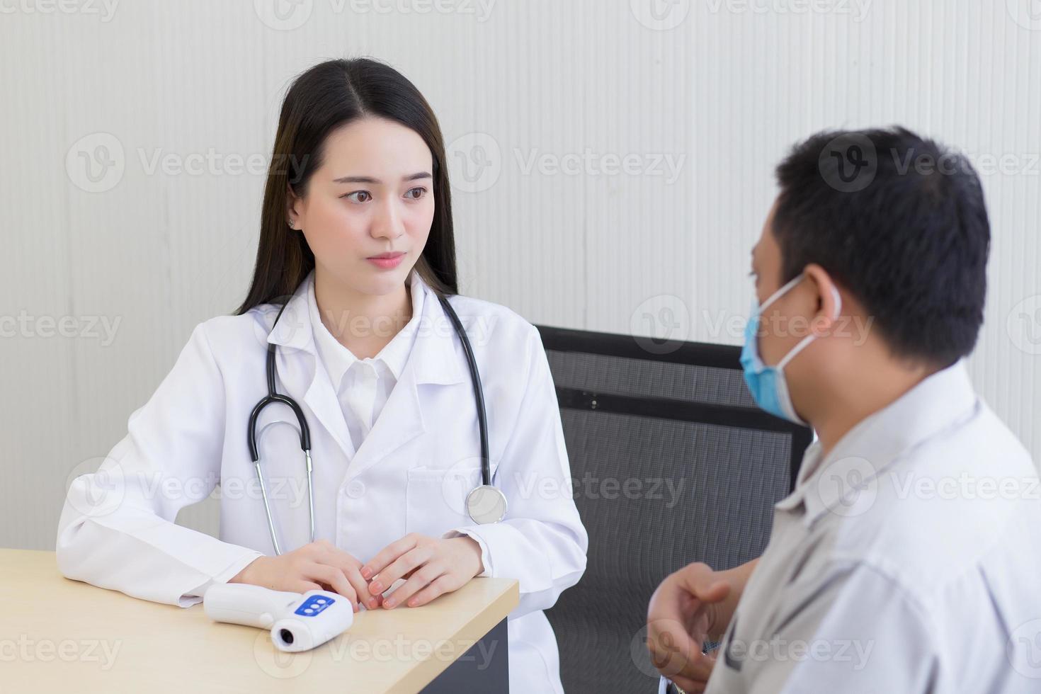 Doctor listen and give advice to hims. photo