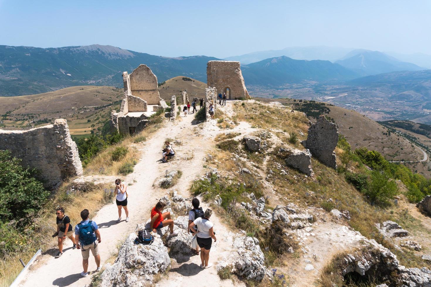 Calascio, Italy-august 9, 2021-particular of the ruins of Rocca Calascio during a sunny day photo