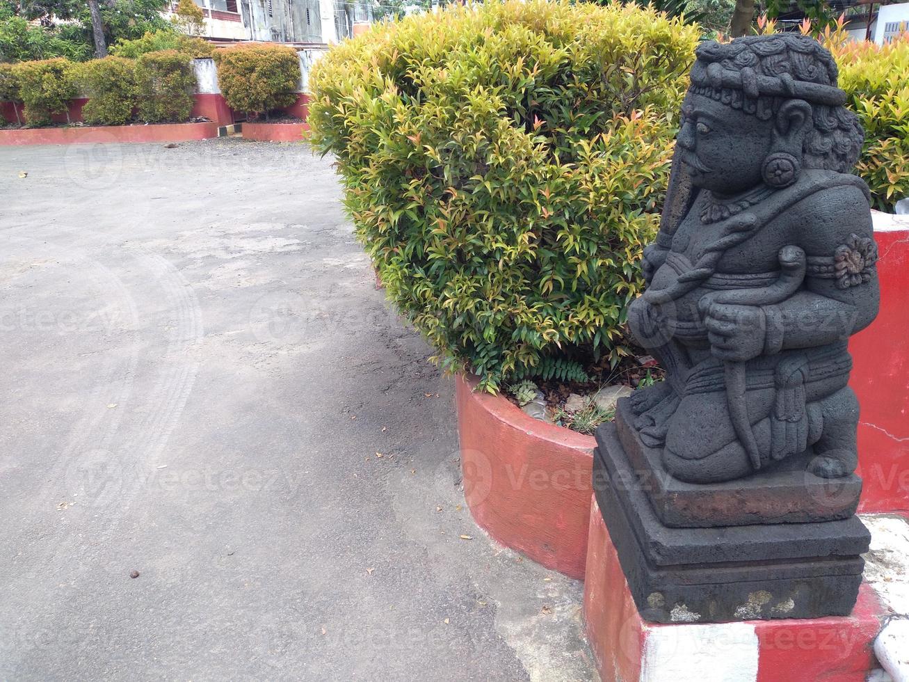 Stone carved statue in Indonesia photo