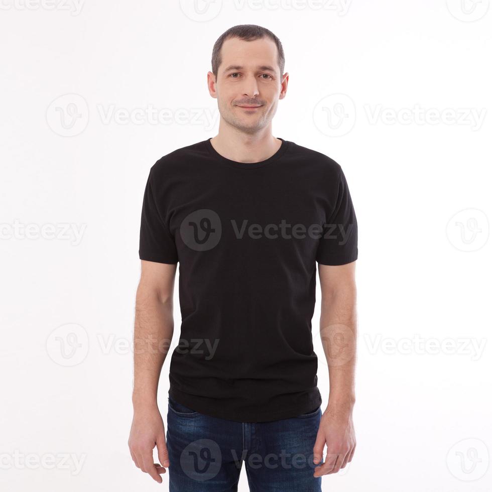 Men's Blank Black T-Shirt Apparel Mockup Bella Canvas Front. Shirt Mock Up Clothes. Young man in blank black tshirt front isolated. Mock up template for design print photo