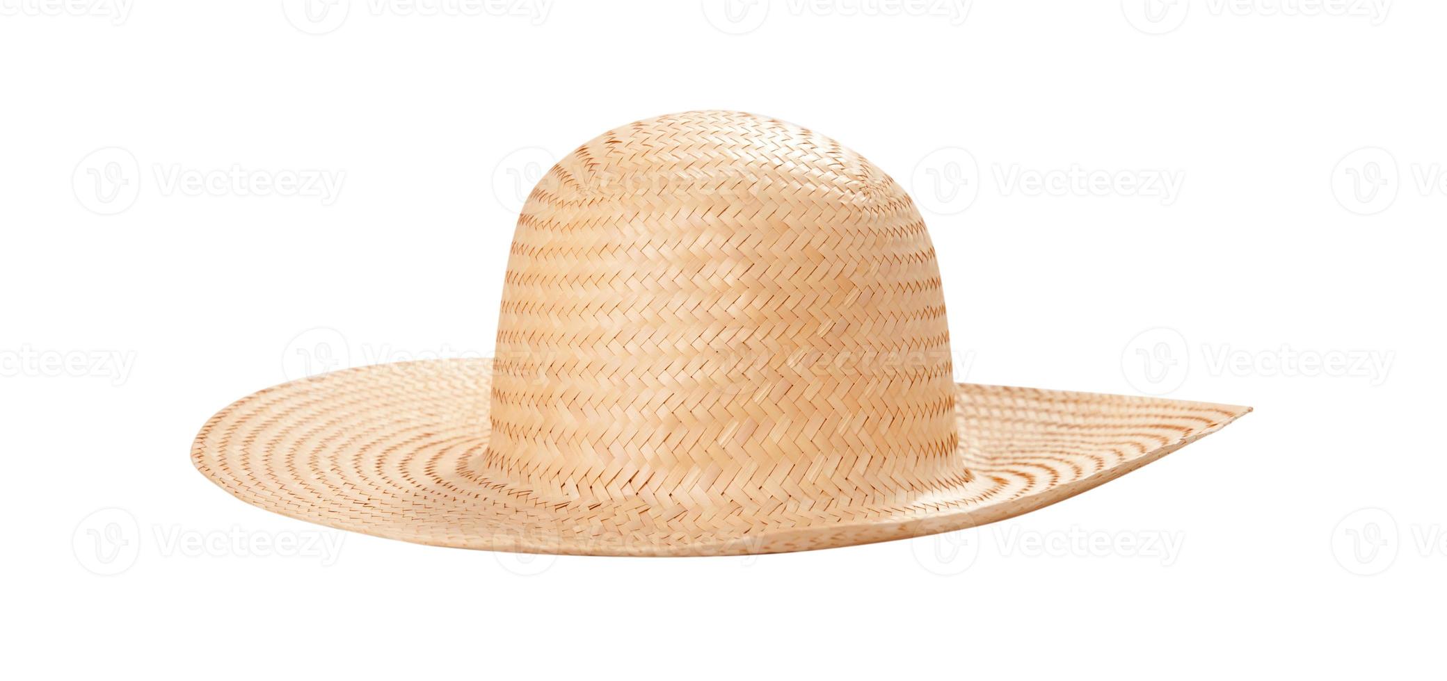 Pretty straw hat with ribbon and bow on white background. Beach hat top view isolated photo