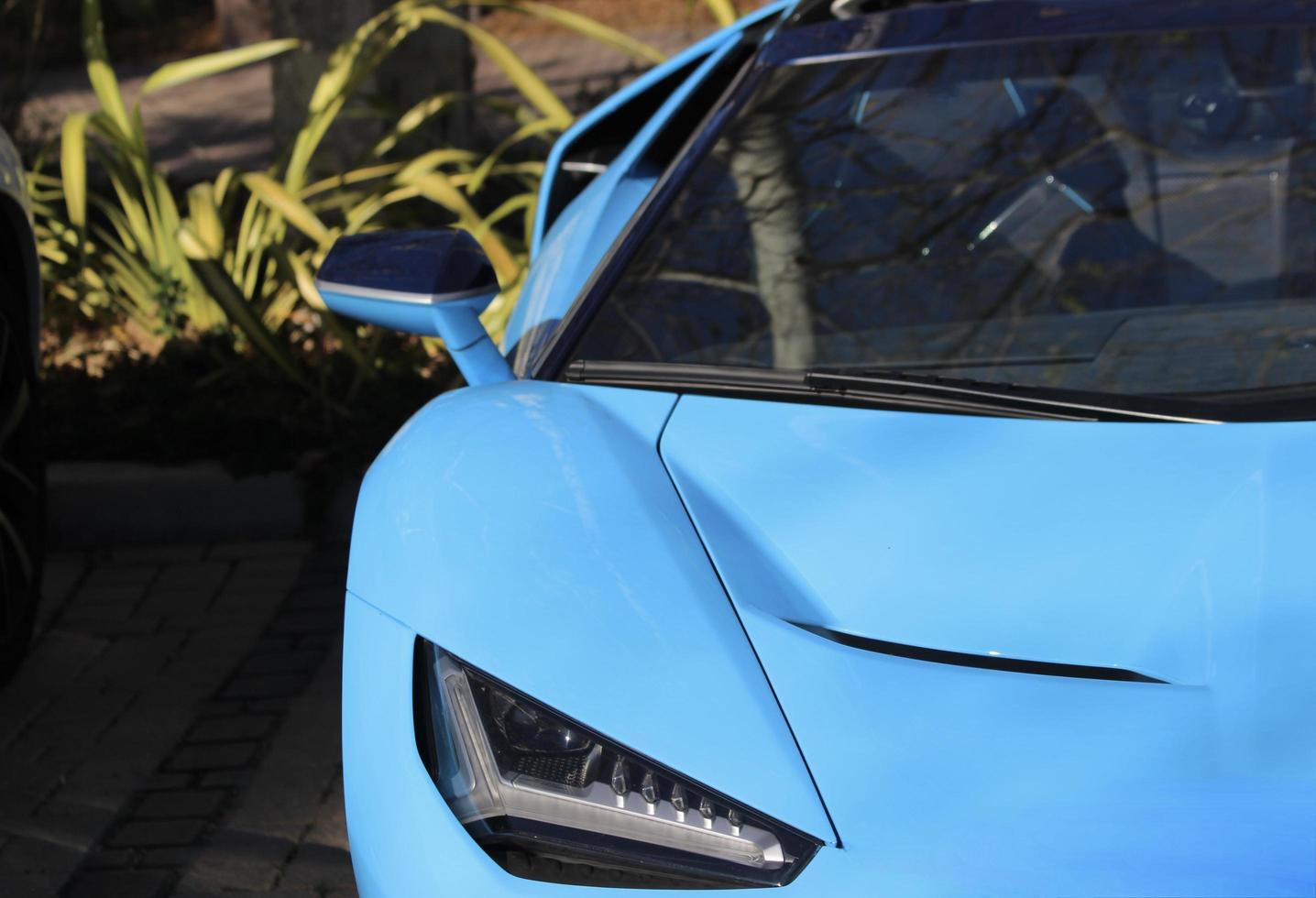 coche deportivo azul hermoso diseño elegante foto