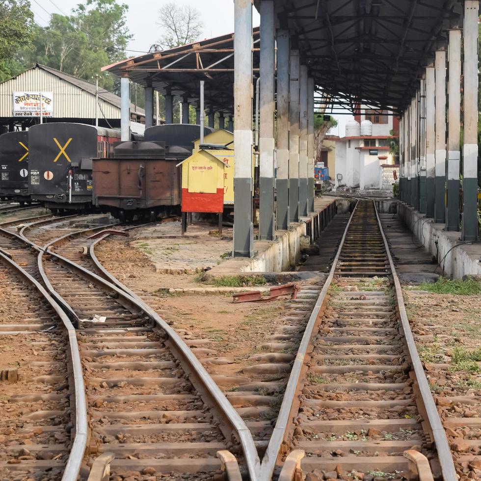 Kalka, Haryana, India May 14 2022 - View of Toy train Railway Tracks from the middle during daytime near Kalka railway station in India, Toy train track view, Indian Railway junction, Heavy industry photo