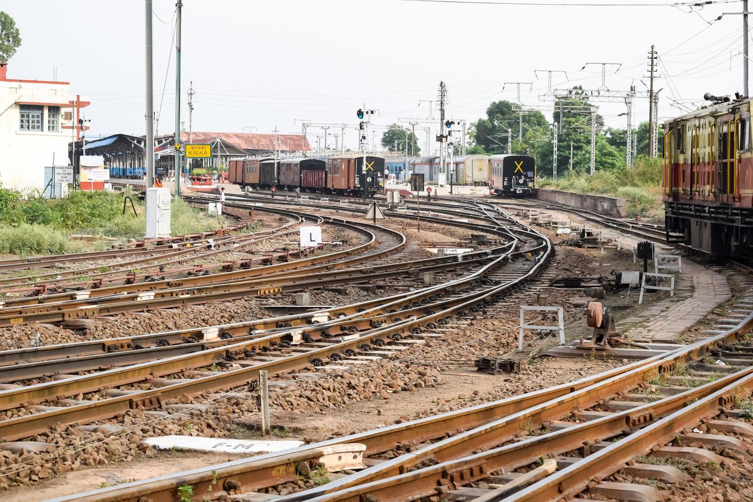 Kalka, Haryana, India May 14 2022 - View of Toy train Railway Tracks from the middle during daytime near Kalka railway station in India, Toy train track view, Indian Railway junction, Heavy industry photo