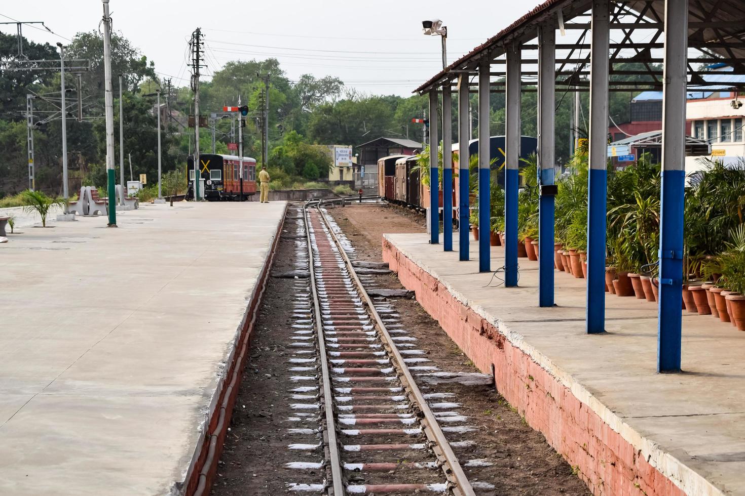 Kalka, Haryana, India May 14 2022 - View of Toy train Railway Tracks from the middle during daytime near Kalka railway station in India, Toy train track view, Indian Railway junction, Heavy industry photo