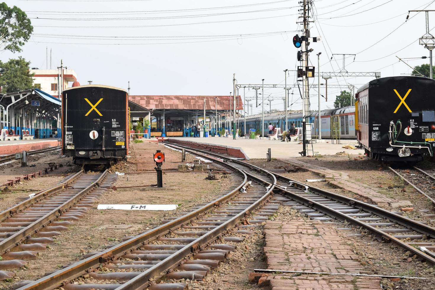 Kalka, Haryana, India May 14 2022 - View of Toy train Railway Tracks from the middle during daytime near Kalka railway station in India, Toy train track view, Indian Railway junction, Heavy industry photo