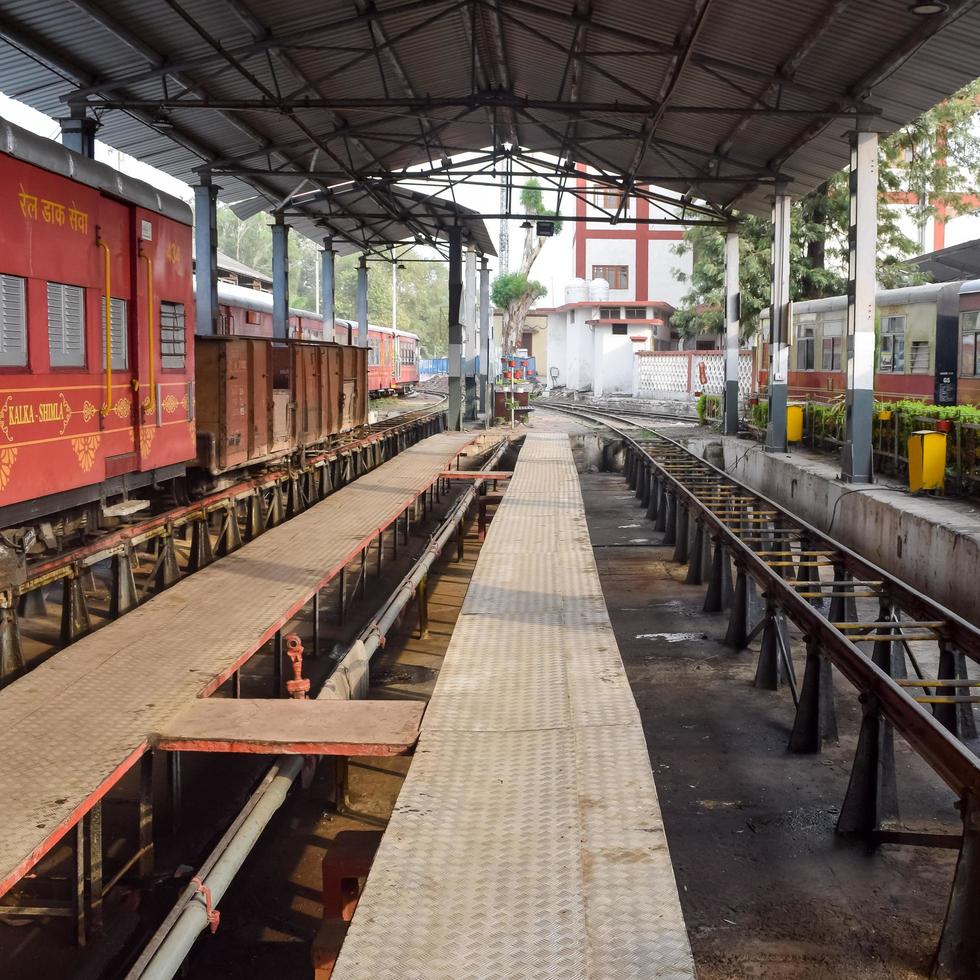 Kalka, Haryana, India May 14 2022 - View of Toy train Railway Tracks from the middle during daytime near Kalka railway station in India, Toy train track view, Indian Railway junction, Heavy industry photo