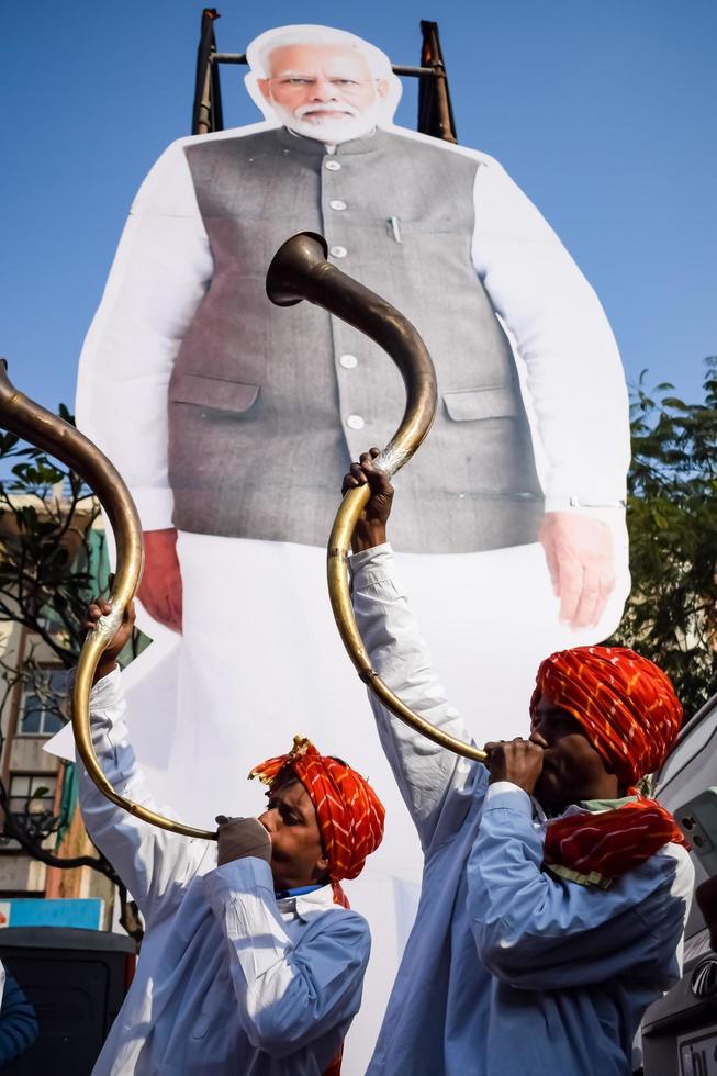 New Delhi, India - January 16 2023 - Prime Minister Narendra Modi cut out during BJP road show, the status of PM Modi while attending a big rally in the capital photo