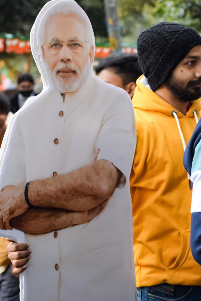 New Delhi, India - January 16 2023 - Prime Minister Narendra Modi cut out during BJP road show, the status of PM Modi while attending a big rally in the capital photo