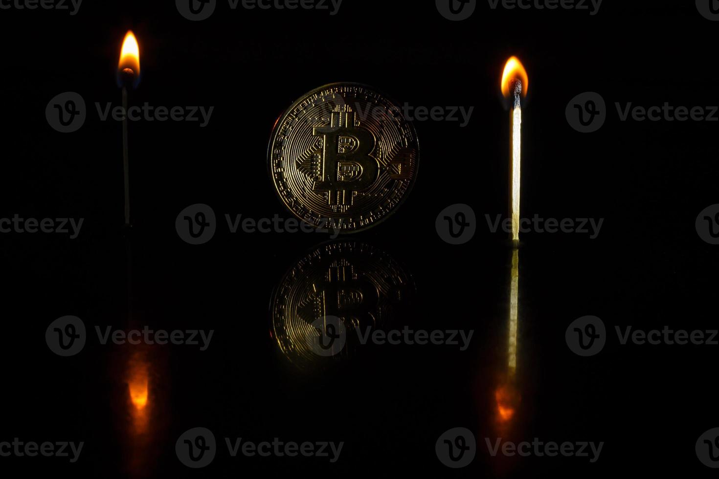 Golden bitcoin on black background with copy space cryptocurrency mining concept photo