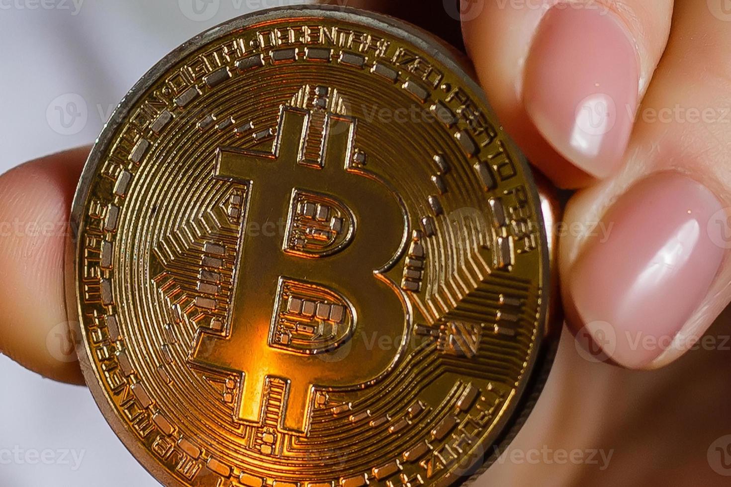 Bitcoin in hand on white background match, fire, flame, burning photo