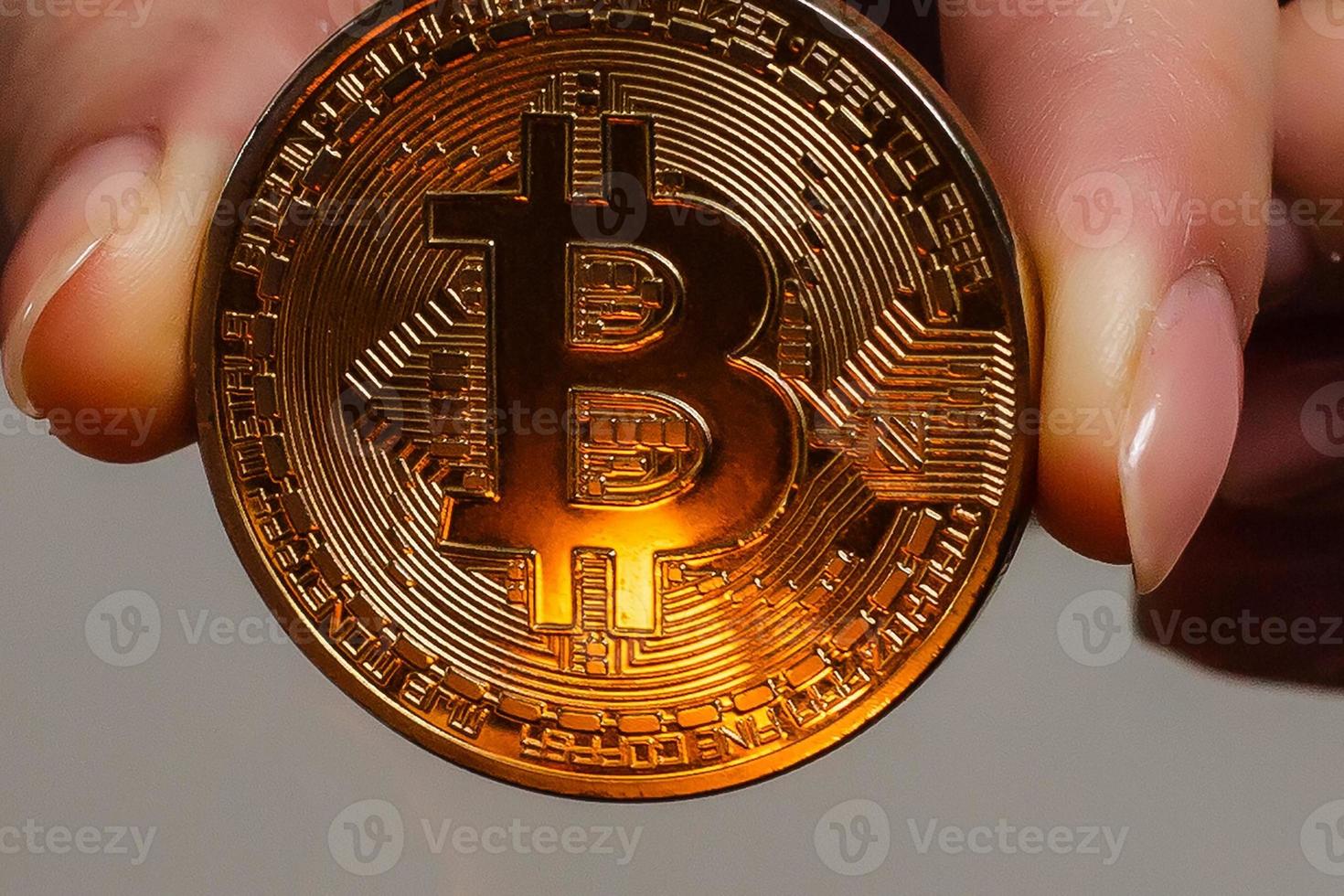 Bitcoin in hand on white background match, fire, flame, burning photo