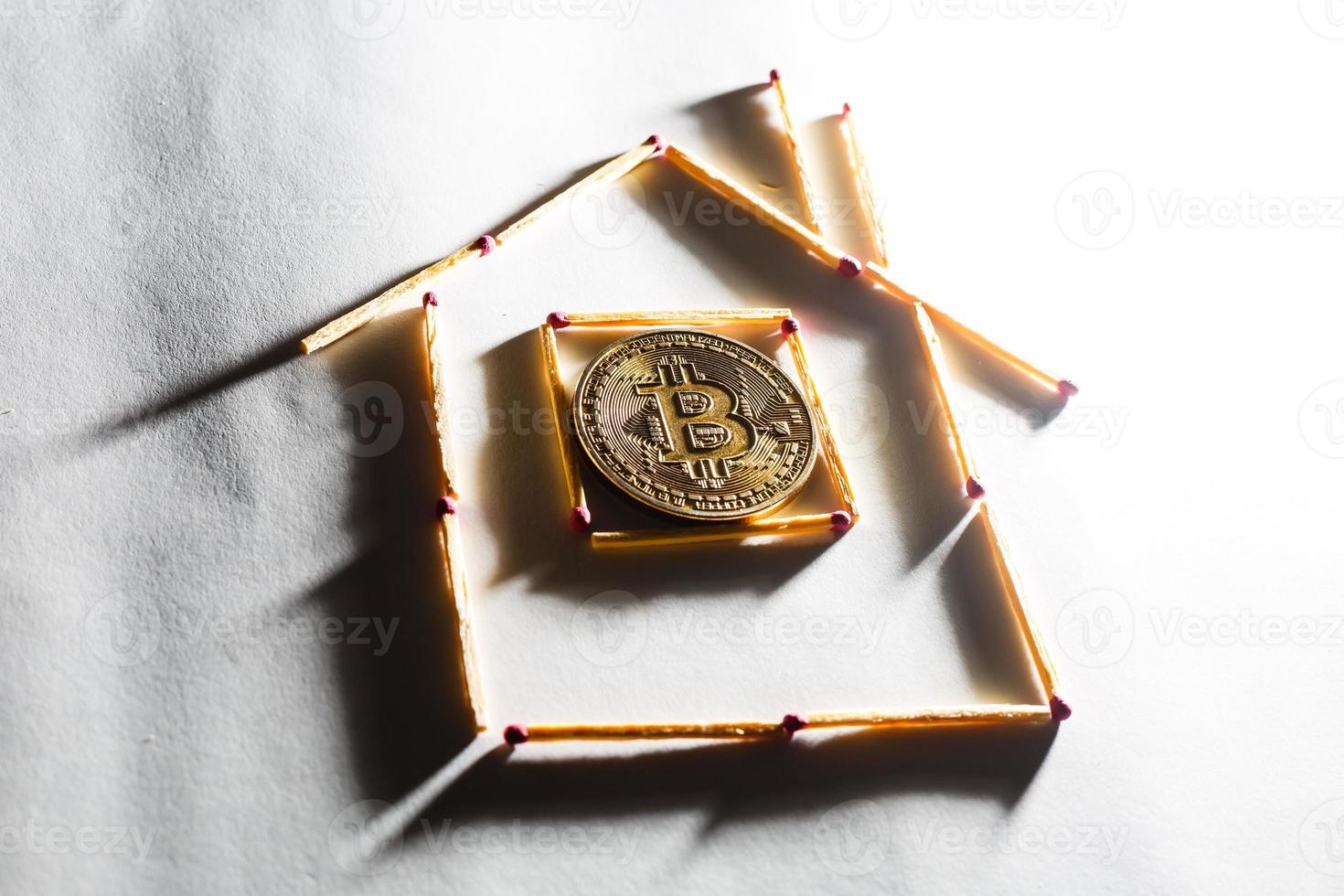 Golden bitcoin on isolate white background concept mining house, apartment, purchase, photo