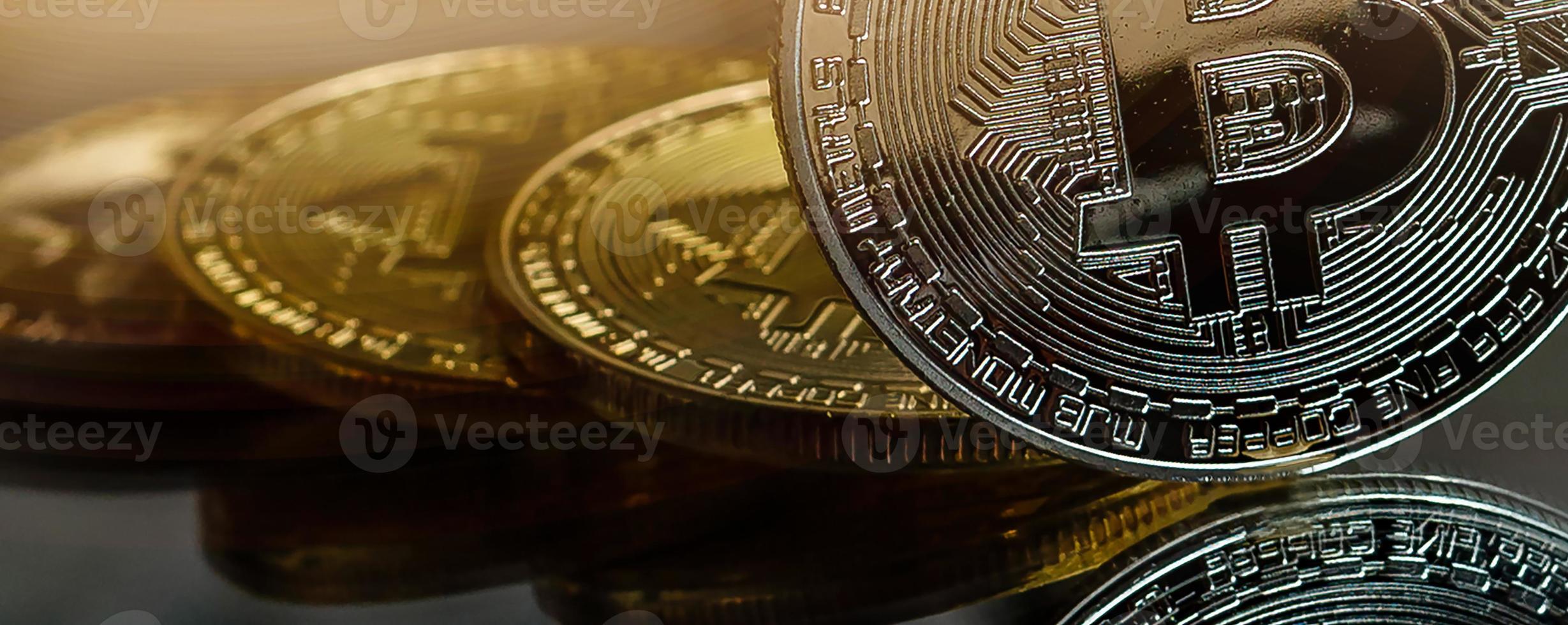 Stack of bitcoins with gold background photo
