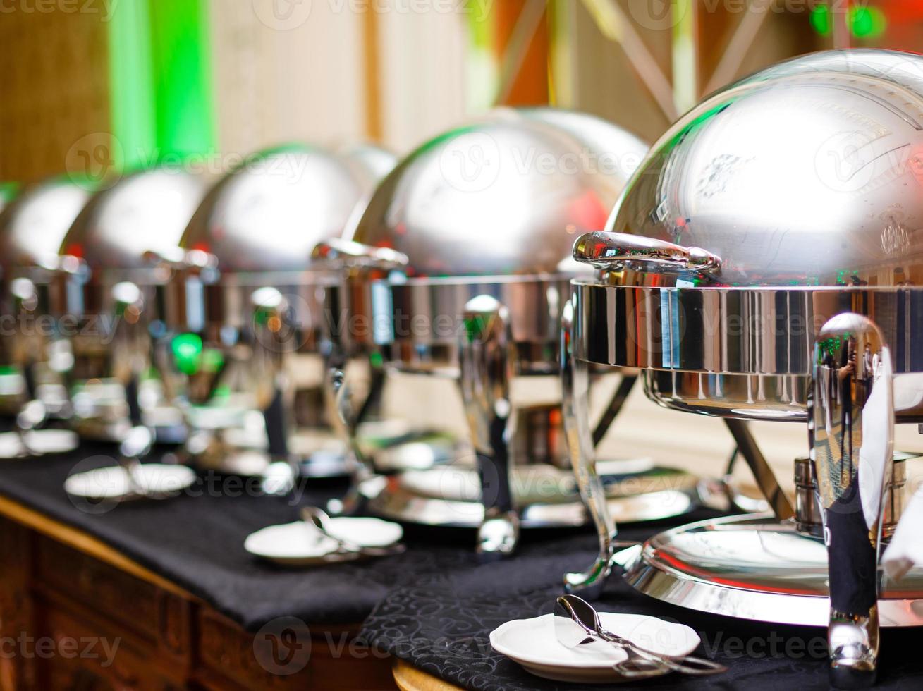 Self-service restaurant, pans on a buffet table photo