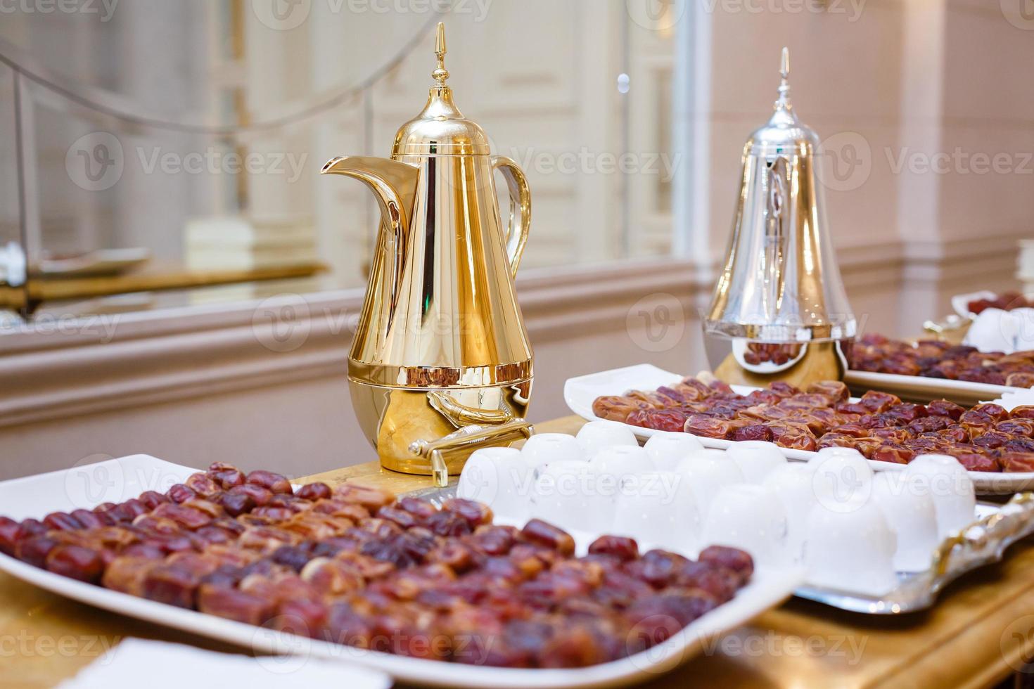 Dates on a tray and decanters photo