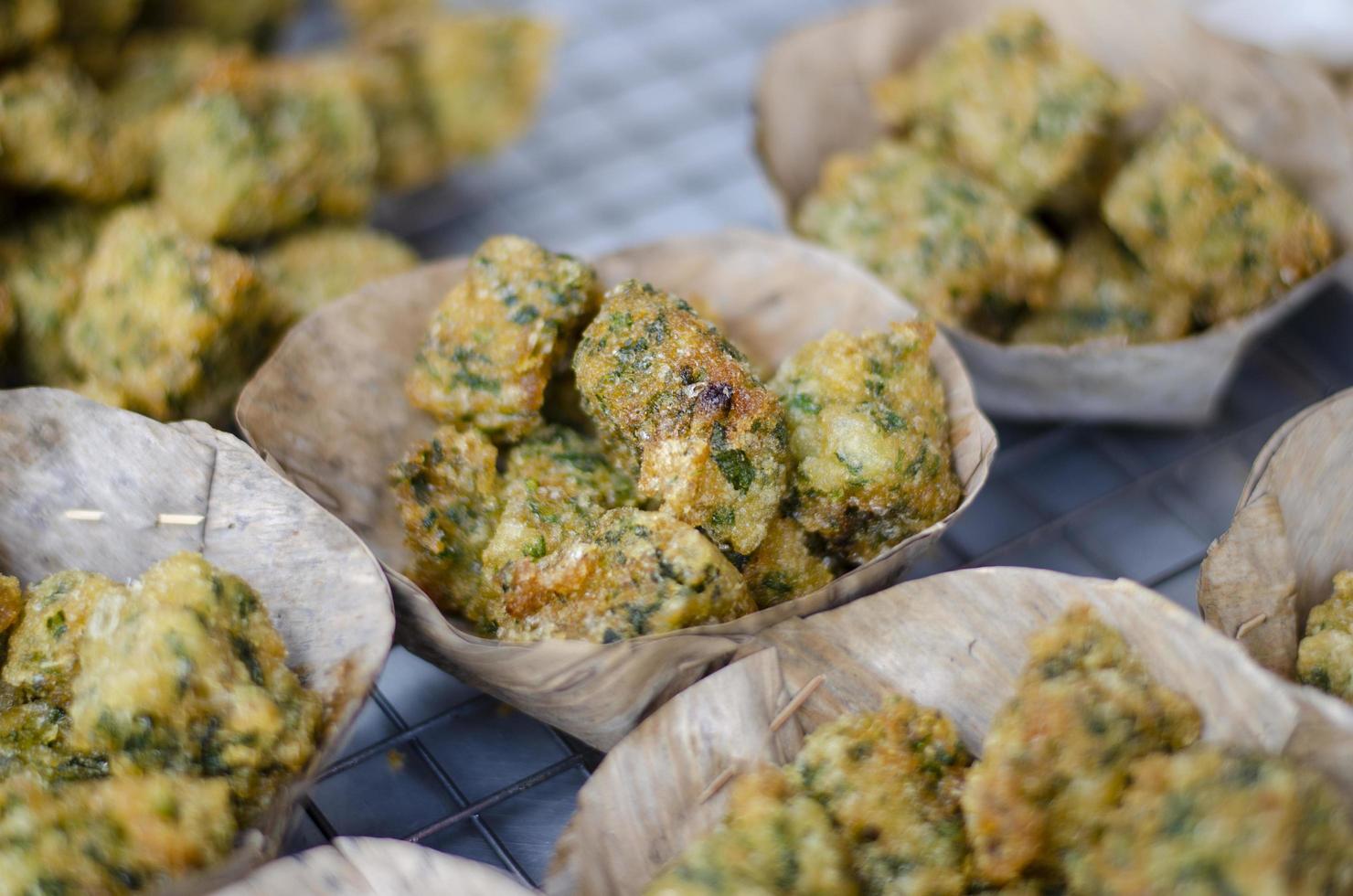 Garlic Chives Cakes on banana leaves, Asian style food photo
