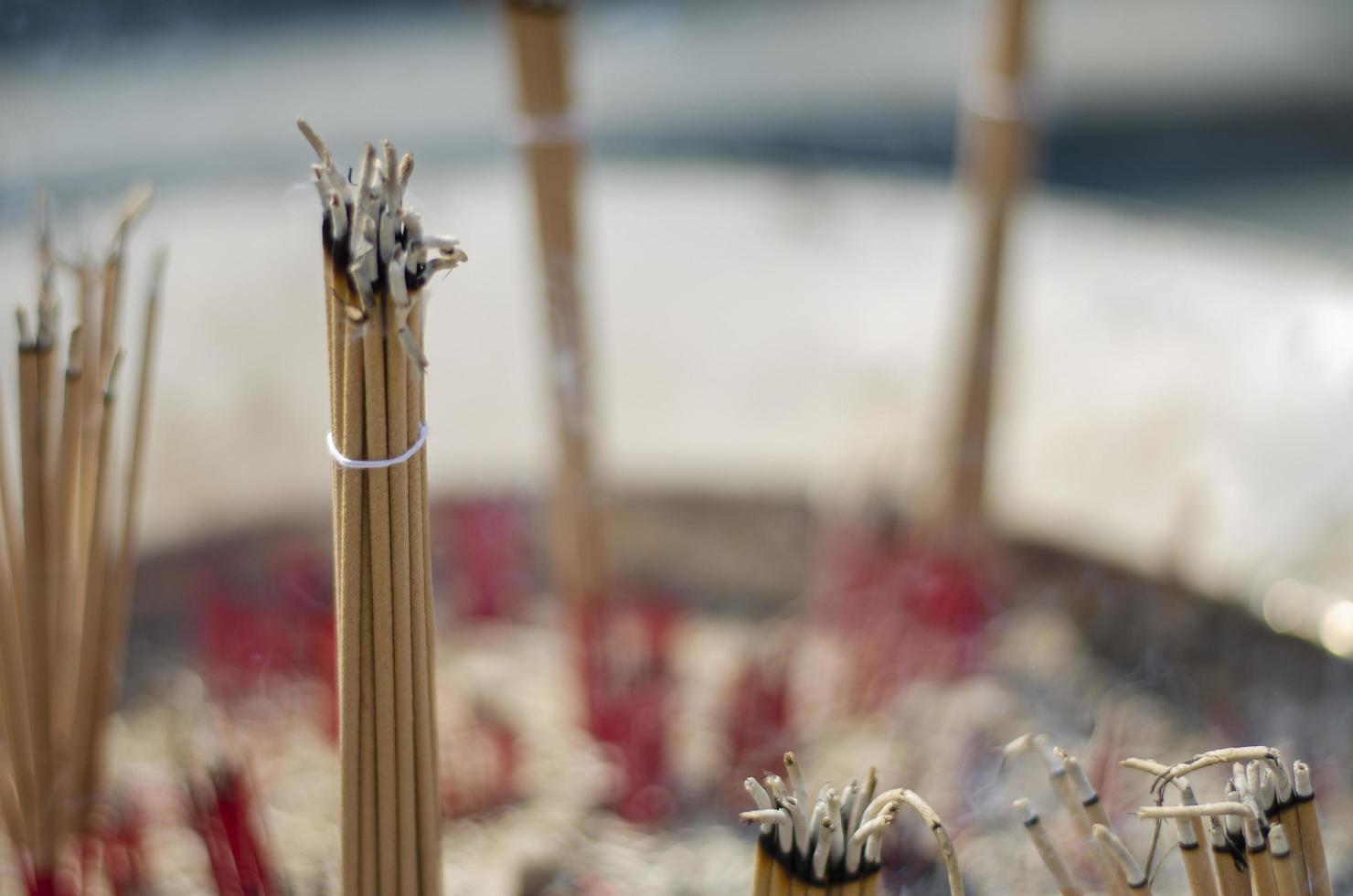 Burning incense sticks in a pot. Incense for praying Buddha or Hindu gods to show worship. bless the holy photo