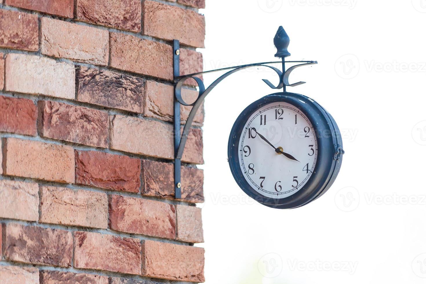 old hours, 4 hours Clock on wood table in the green garden time at o clock photo
