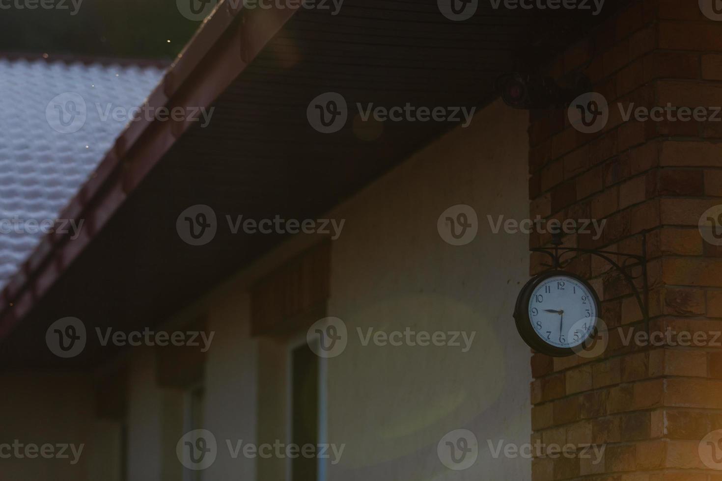 old hours, 9.30 hours Clock on wood table in the green garden time at o clock photo