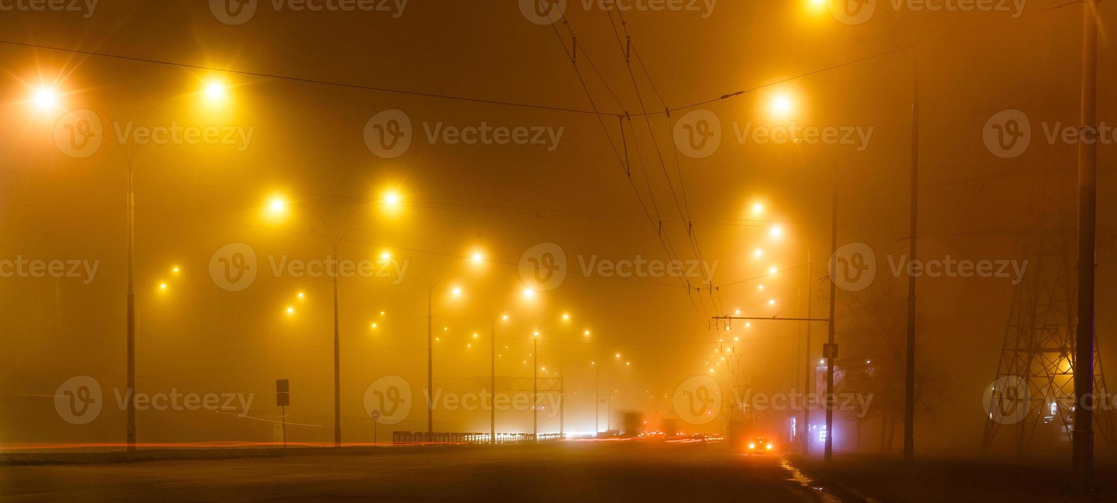 City lights in a foggy night photo