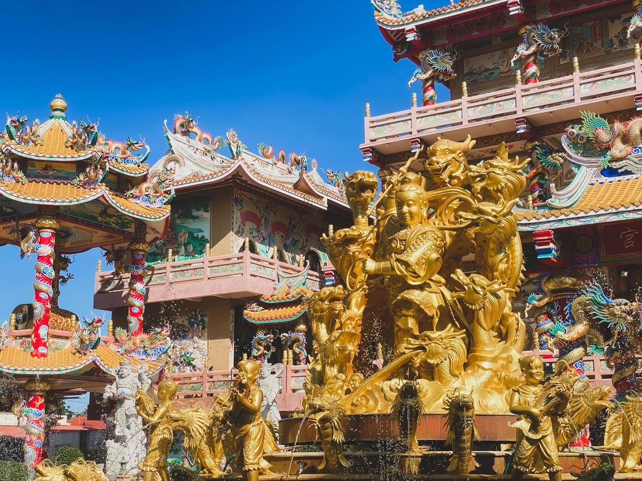 Ang Silla,Chonburi,Thailand-January 14,2023, Naja statue golden is a beautiful Thai and Chinese architecture of Nachas sa thai chute shrine, naja shrine, najasaataichue, nezha shrine chinese temple. photo