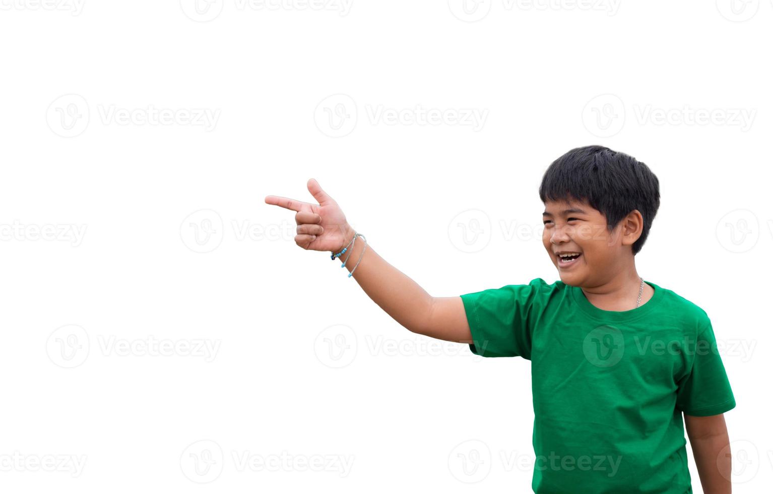 The boy smiled and pointed his hand to his side. on a white background photo