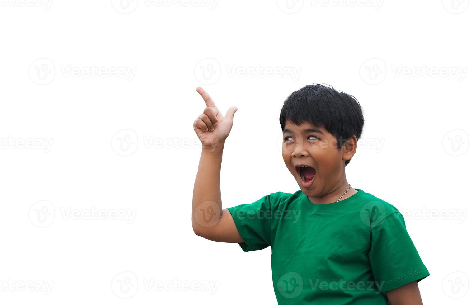 The boy smiled and pointed his hand to his side. on a white background photo