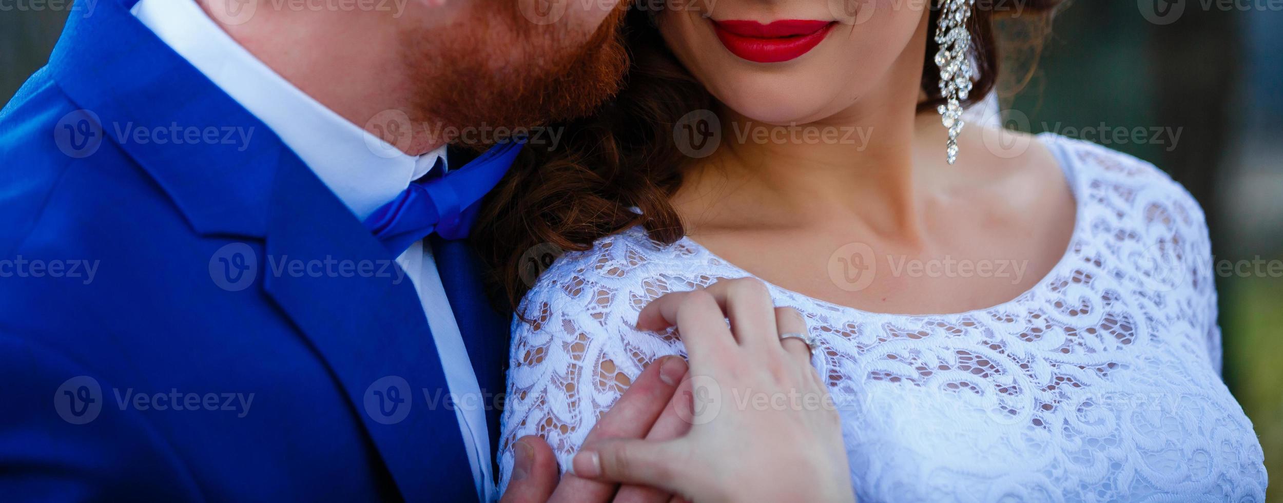 Just married couple embraced photo