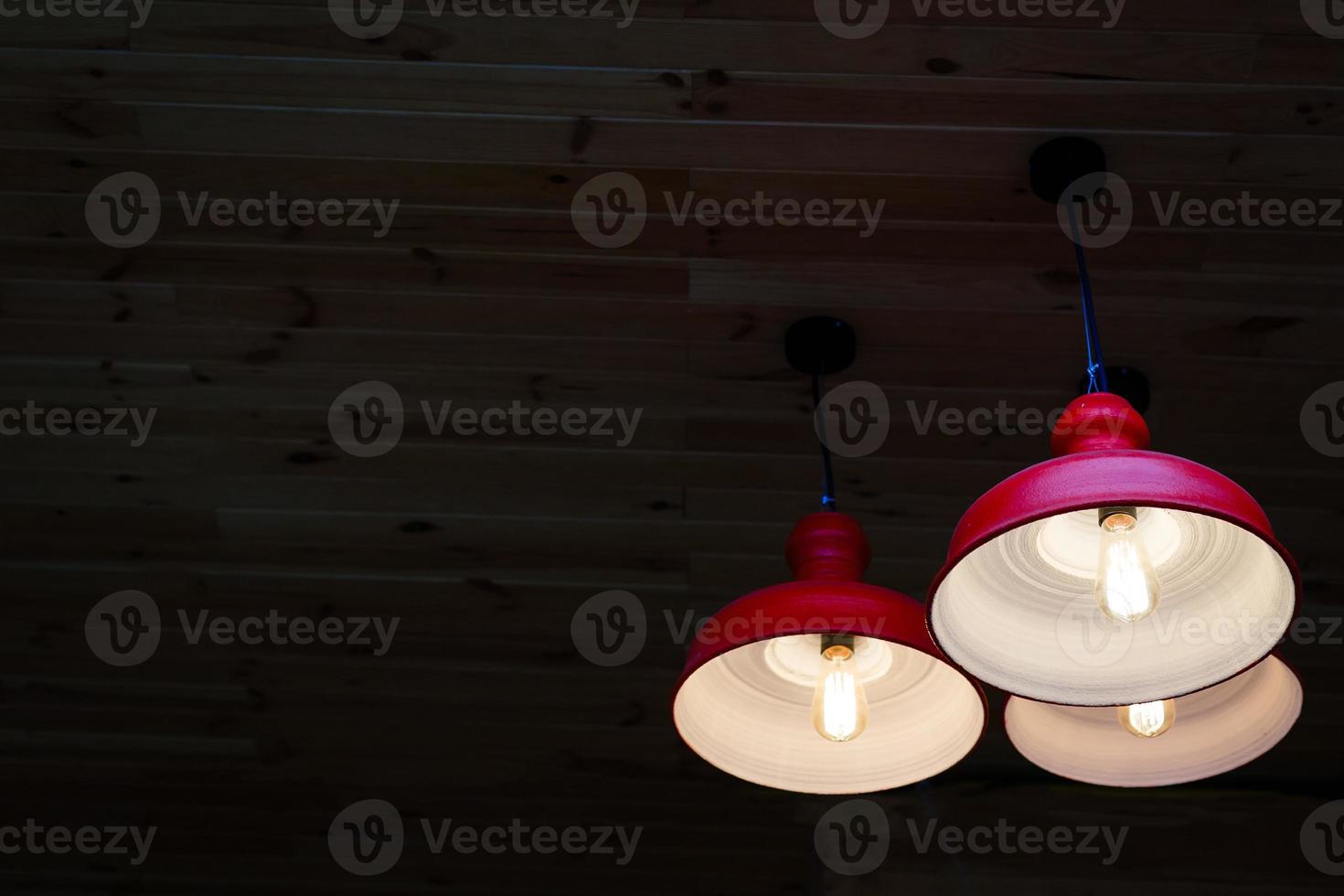 Round stylish lampshade on dark background photo