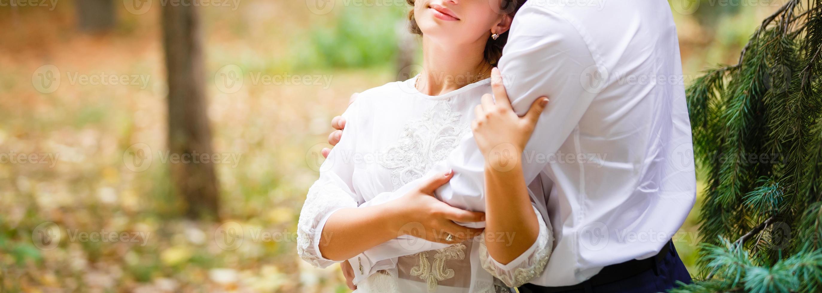 Just married couple embraced photo