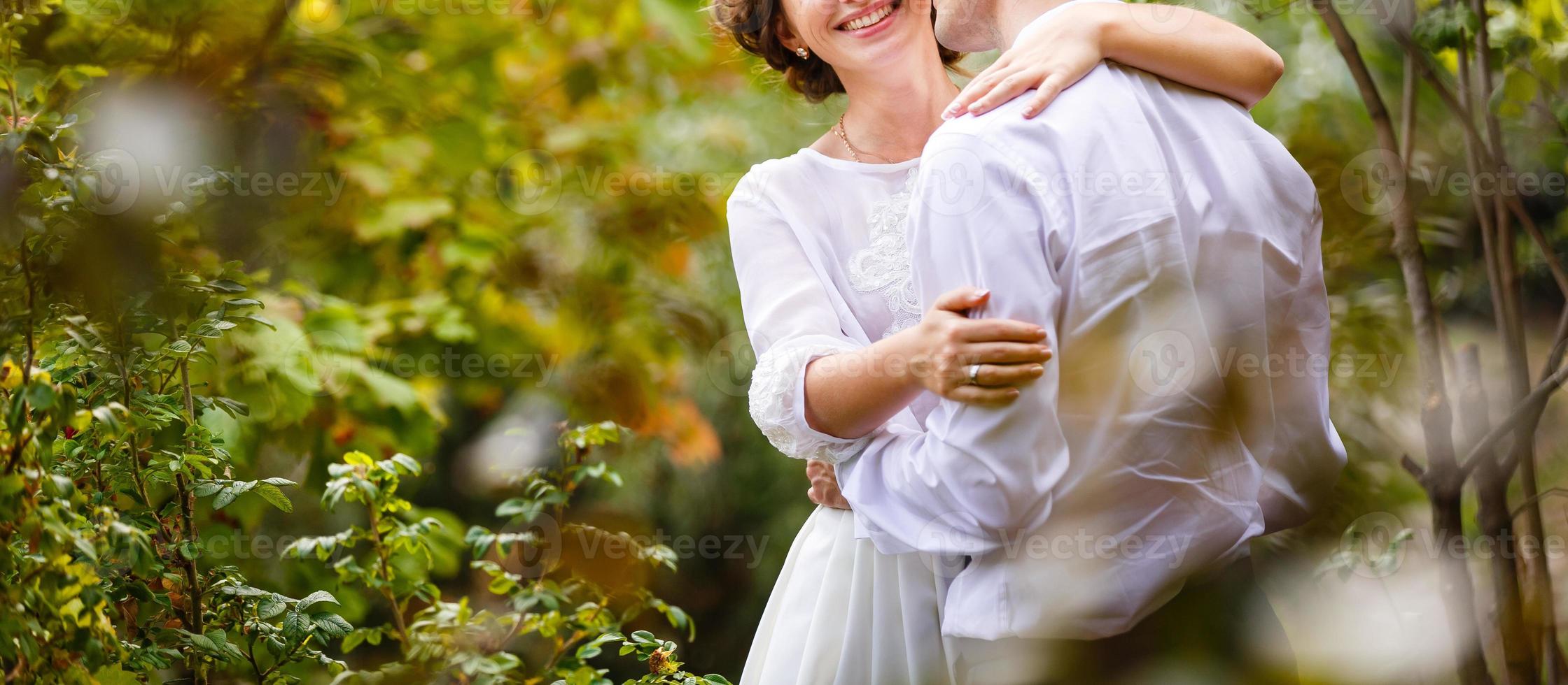 Luxury married wedding couple bride and groom posing in park autumn photo