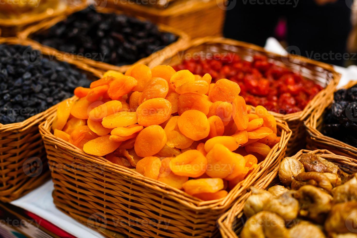 wicker baskets with dried fruits photo