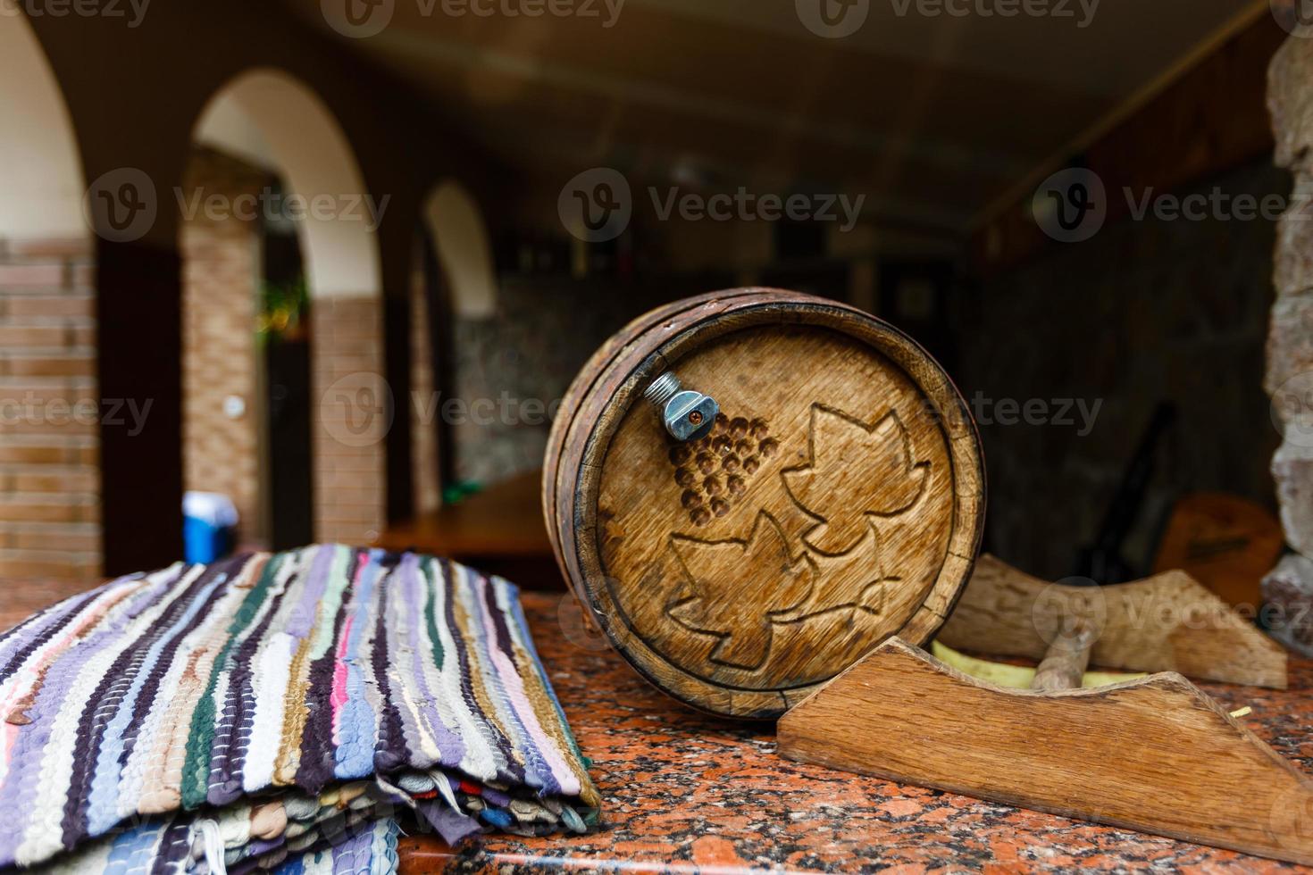 a barrel of wine in a wine cellar photo