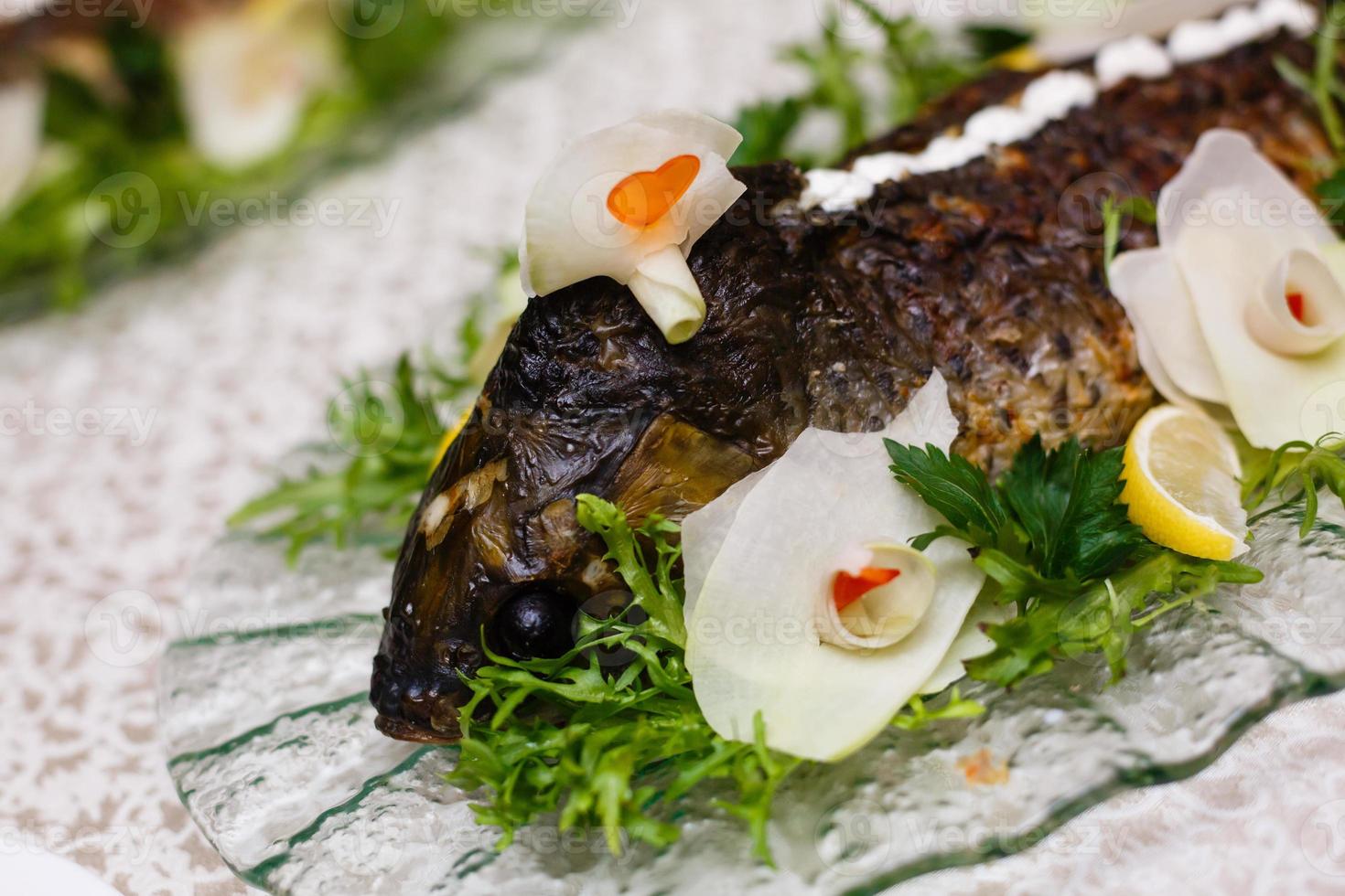 Stuffed fish on banquet photo