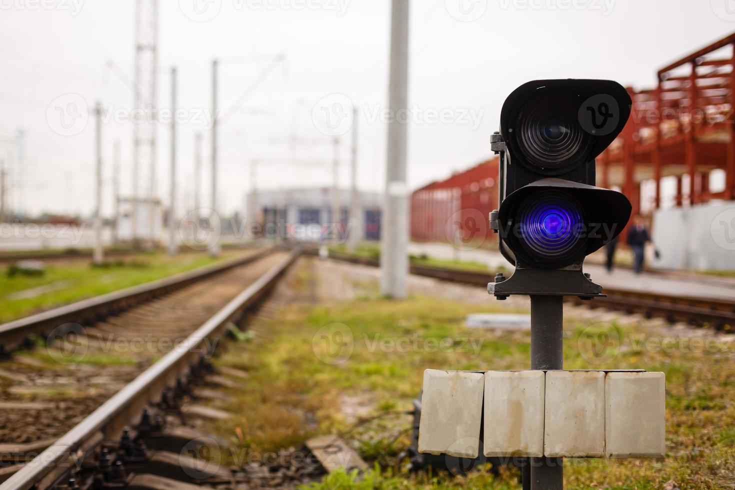 Blue semaphore lights on modern cargo railway photo