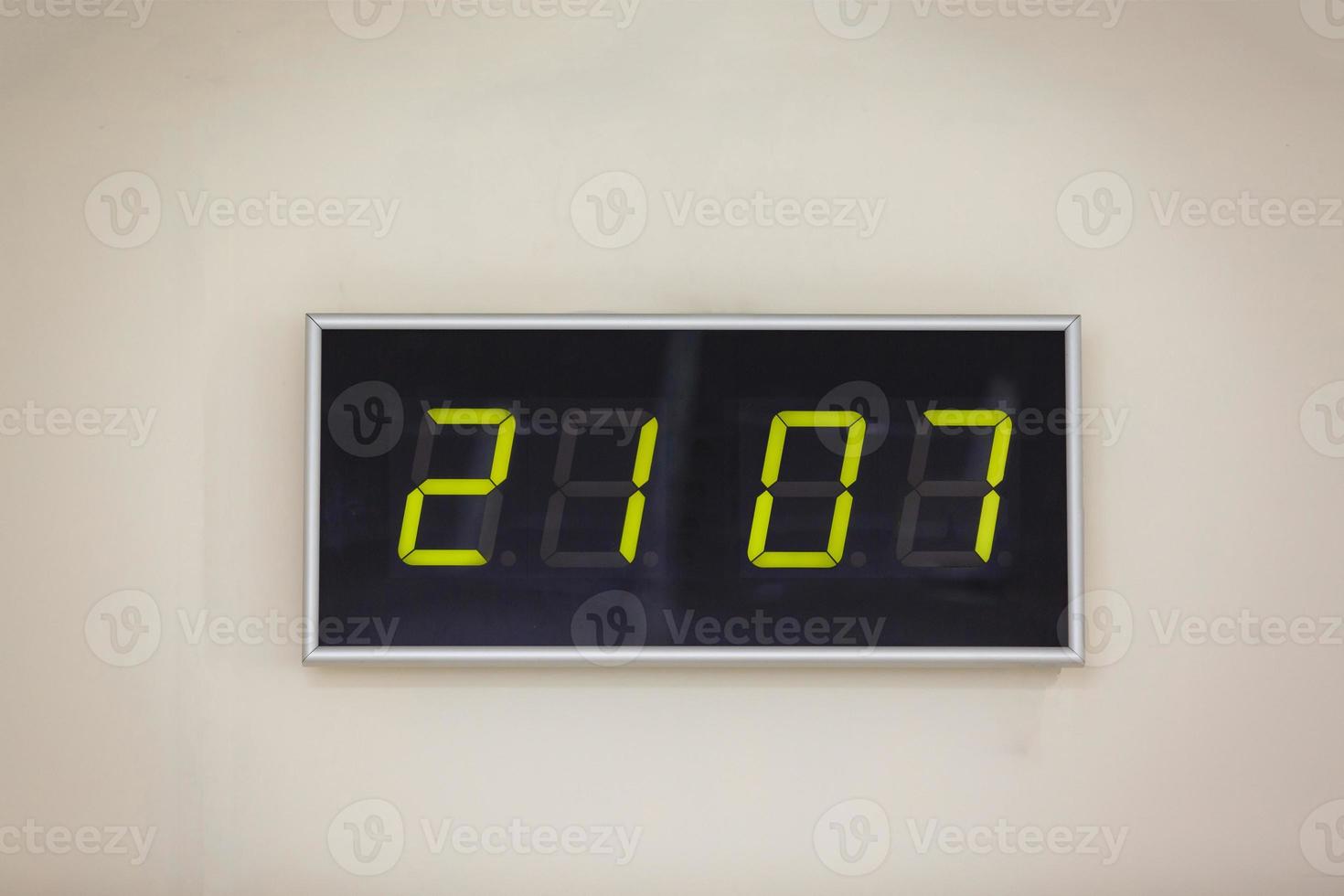 Happy new year Black digital clock on a white background showing time  2107 photo