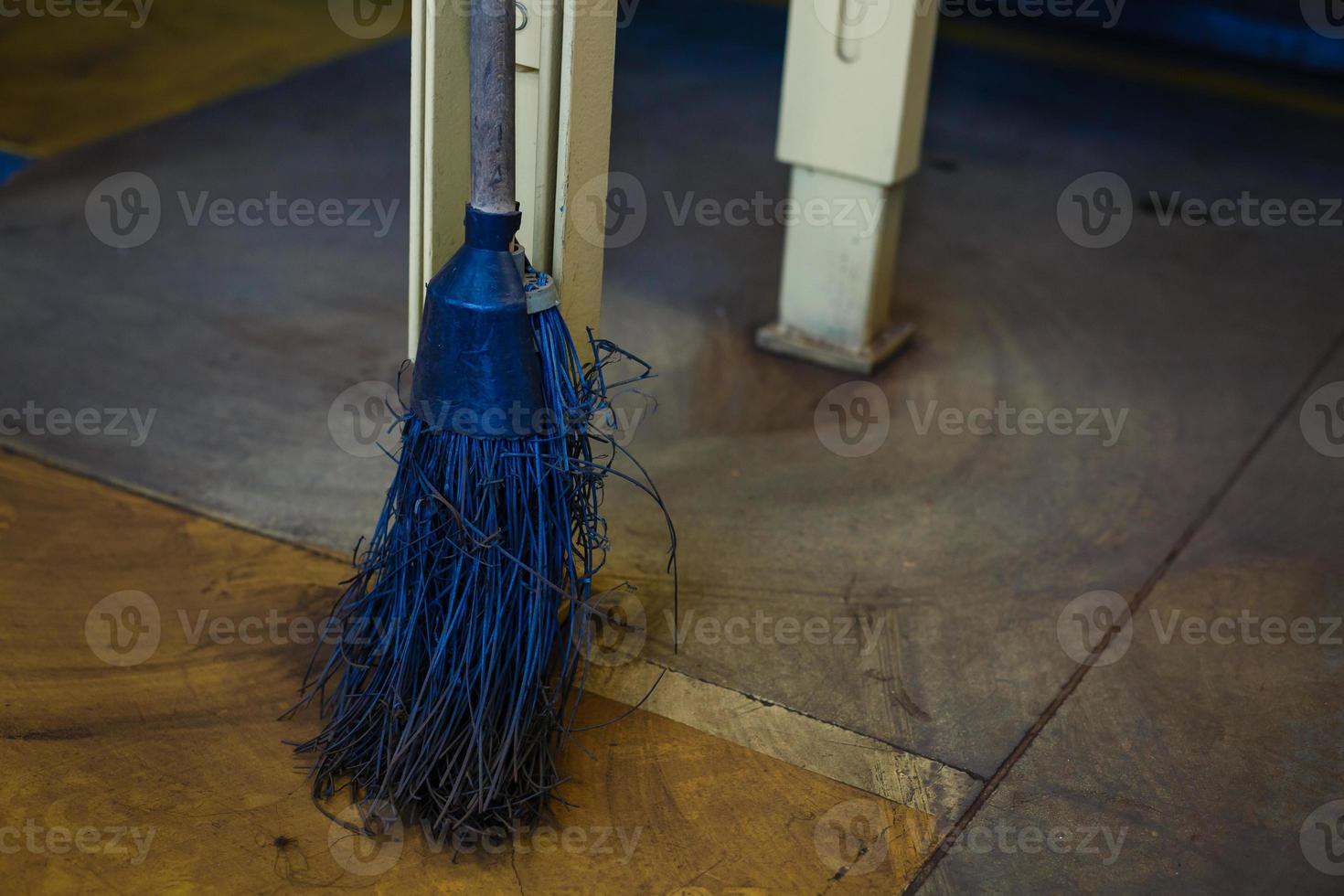 The broom is made from metal forging and wire souvenir closeup photo