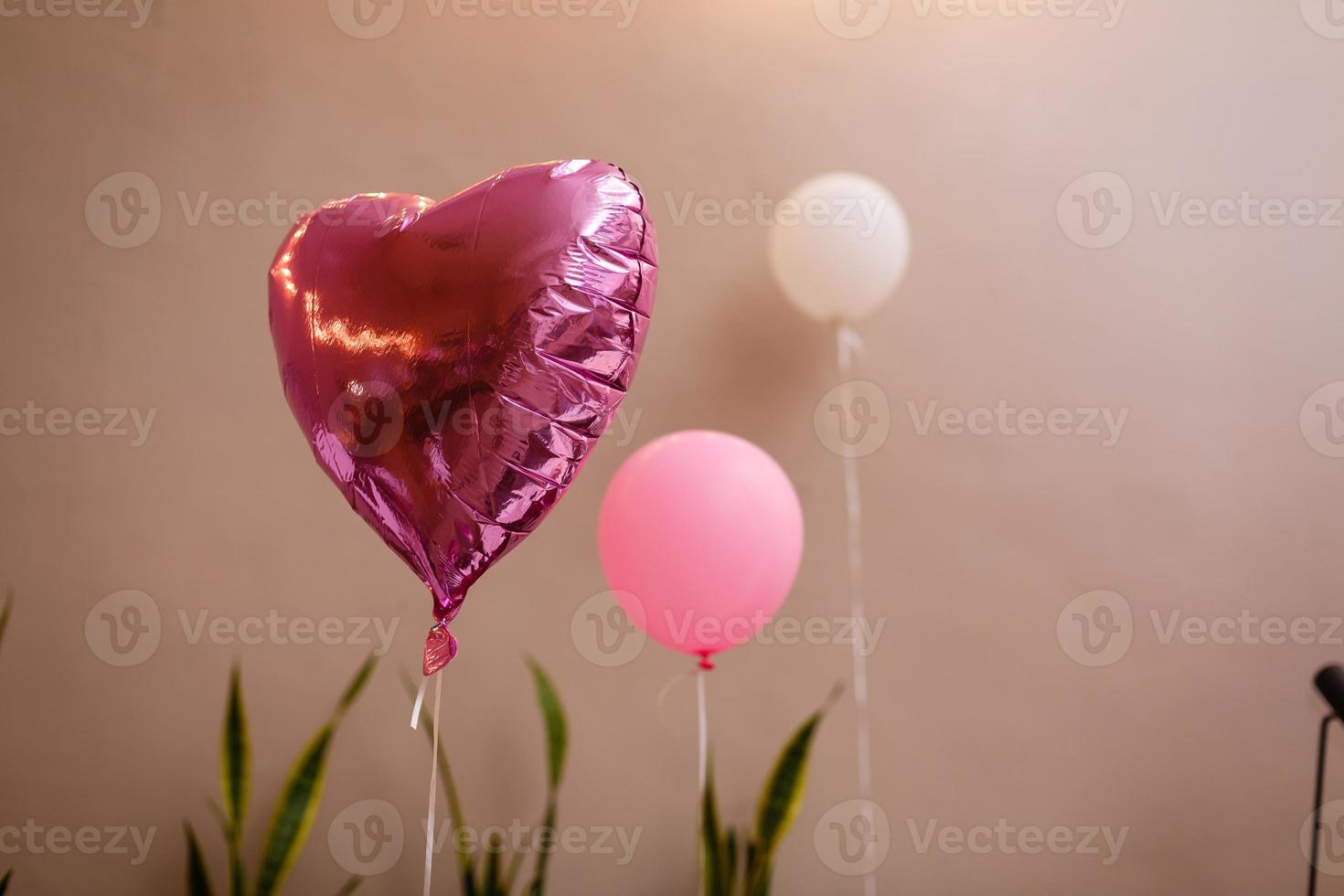 pink balloon in the form of a heart photo