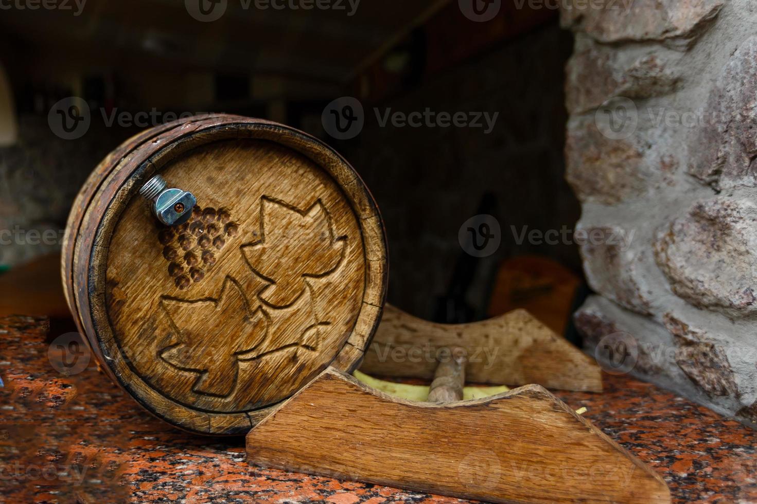 a barrel of wine in a wine cellar photo