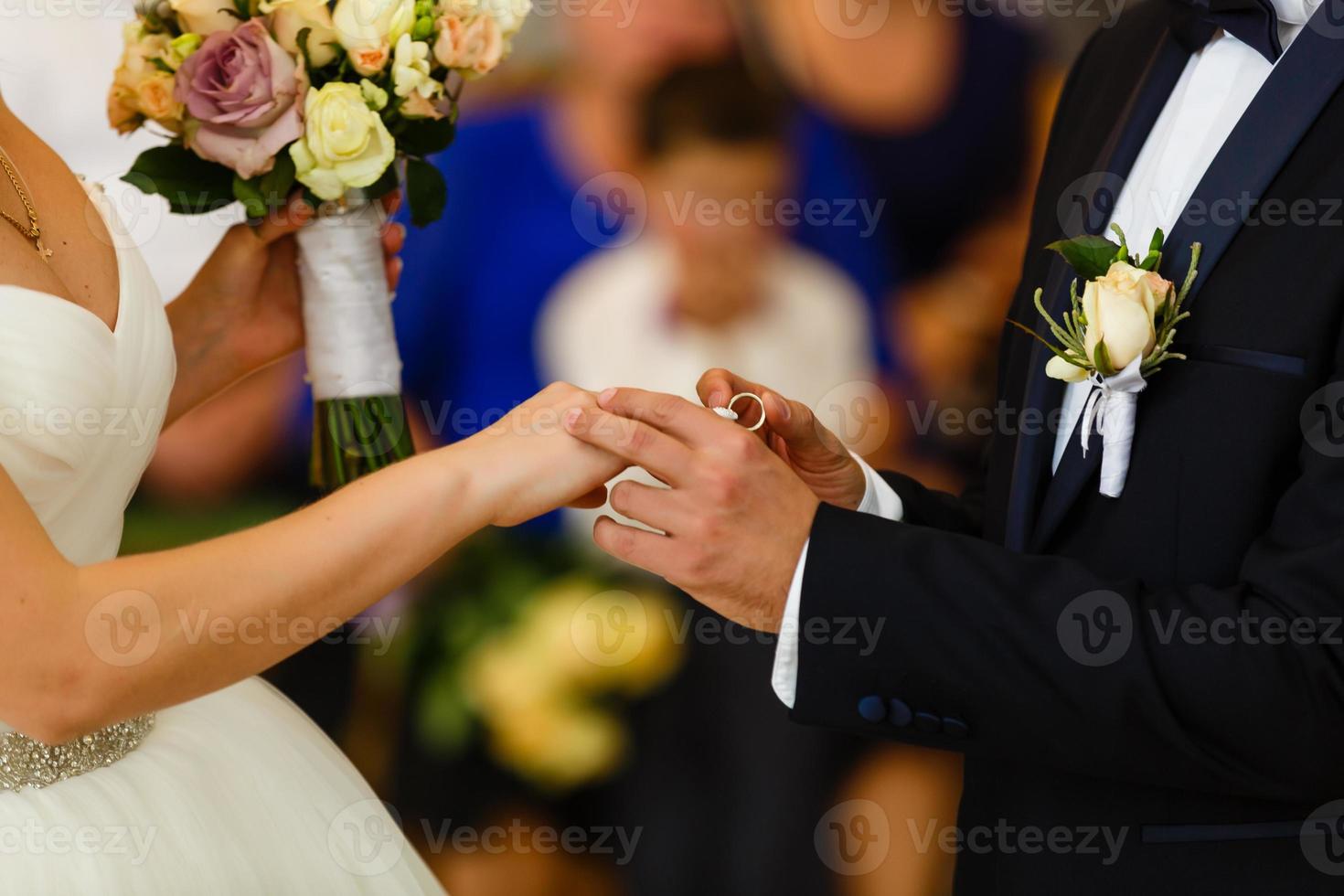 Bride and groom close up at wedding ceremony photo