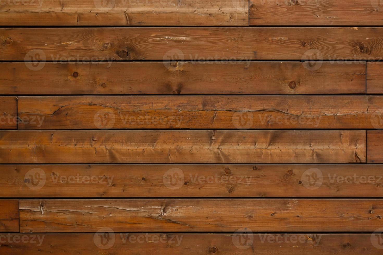 el fondo marrón de madera proviene de la pared de tableros horizontales de madera horizontal foto